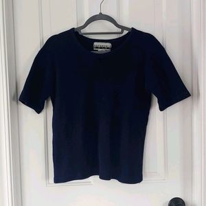 Blue knit top with small bow detail